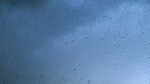 Water drops on window glass Stock Footage 7736878