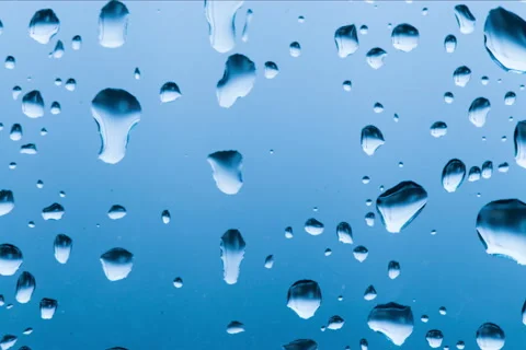 Water drops on a window panning down Stock Footage 45623777