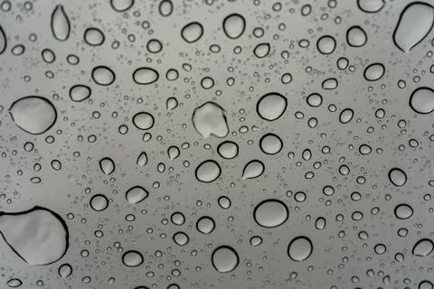 Water drops on a window Stock Photos