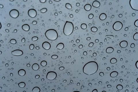 Water drops on a window Stockfoto's