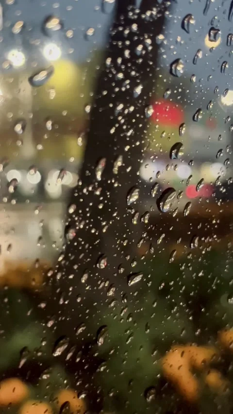 Water drops on the window with a view of night street Stock Footage 336511005