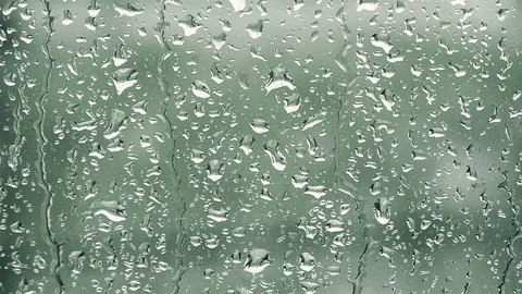 Water drops in a windows Stockbeeldmateriaal 80207316
