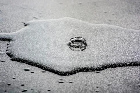 Water drops on work surface in eruption Stock Photos