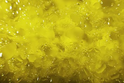 Water drops on a yellow background. Abstract yellow background. Water drops.. Foto stock