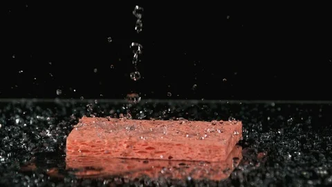 Water on dry sponge Stock Footage 92610742