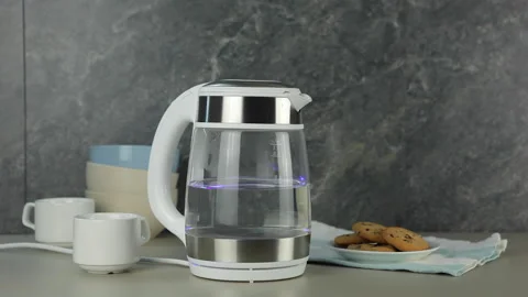 The water in the electric kettle is boiling. Boiling water for hot drinks. Stock Footage 160130212