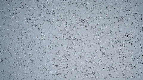 Water evaporating from a glass window surface time lapse Stock Footage 86691443