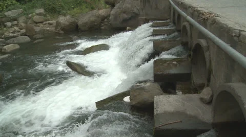 Water exits spillway Stock Footage 25510496