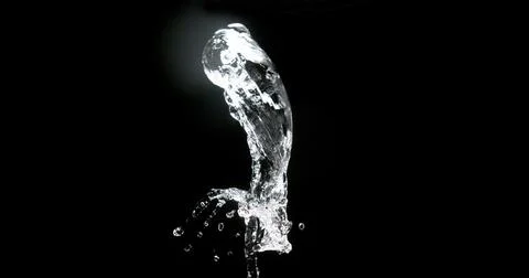 Water Exploding and Splashing against Black Background Foto stock