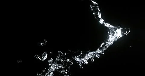 Water Exploding and Splashing against Black Background Foto stock