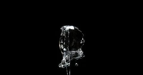 Water Exploding and Splashing against Black Background Stock Photos