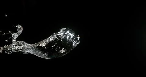 Water Exploding and Splashing against Black Background Foto stock