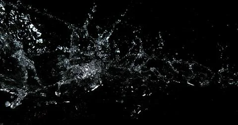 Water Exploding and Splashing against Black Background Foto stock