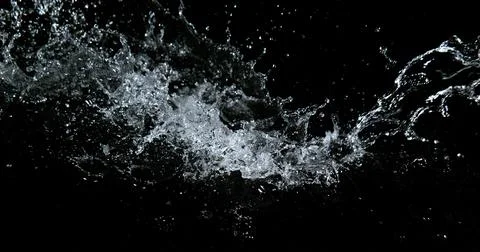 Water Exploding and Splashing against Black Background Foto stock