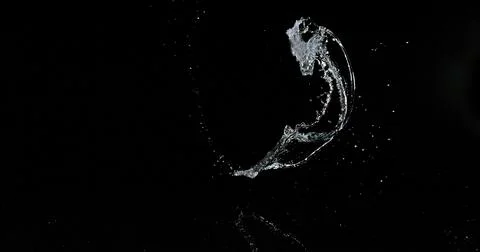 Water Exploding and Splashing against Black Background Foto stock