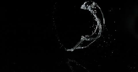 Water Exploding and Splashing against Black Background Foto stock