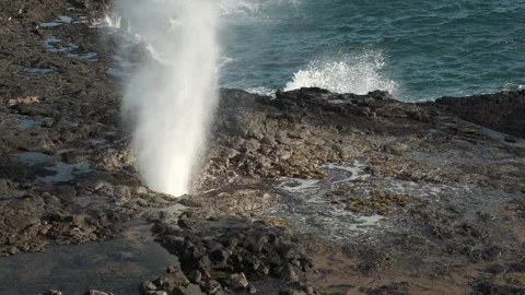 Water exploding out of Sea Cave in Hawaii Stock Footage 250566140