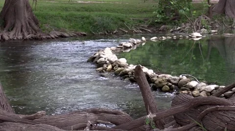 Water fall with curve rocks in clear stream Stock Footage 53311882