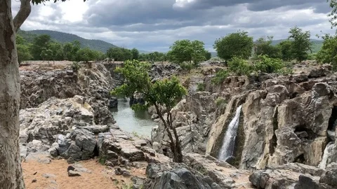 Water fall into the river Video stock 122909763