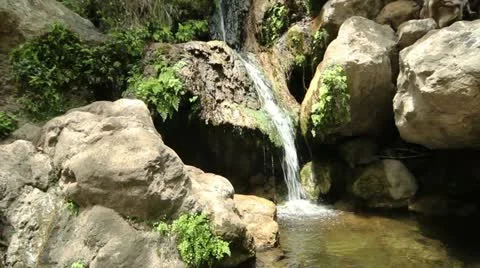 Water Fall Splashing in Pond Stock Footage 11288650