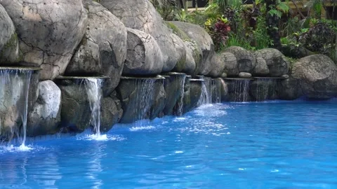 Water fall on swimming pool Stock Footage 211789575