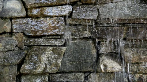 Water Falling Across Stone Wall Stock Footage 322738