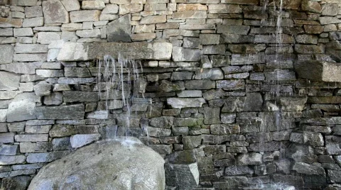 Water Falling on Bolder Stock Footage 322776