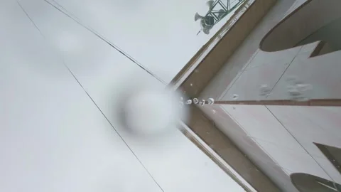 Water falling down to gutter from the roof during heavy rain storm Stock Footage 303767298