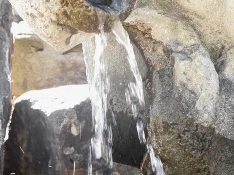 Water falling down over the rocks Stock Photos
