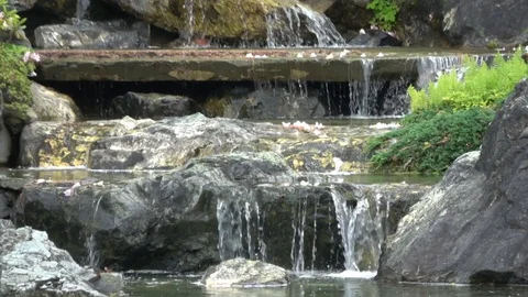 Water falling , flowing down rocks, mountain. Slow motion Stock Footage 106852292