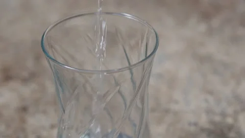 WATER FALLING INTO A GLASS CLOSE 4K C1678 Stock Footage 335303427