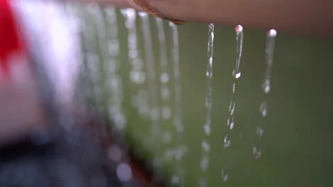 Water falling on ground, beautiful line of droplet backgrond. 스톡 동영상 141011065