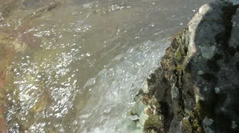 Water Falling Over Rock Stock-Footage 11412101