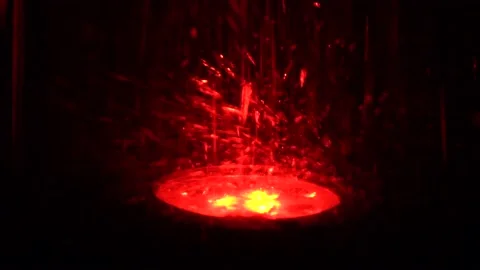 Water falling on the red light Stock Footage 205276664