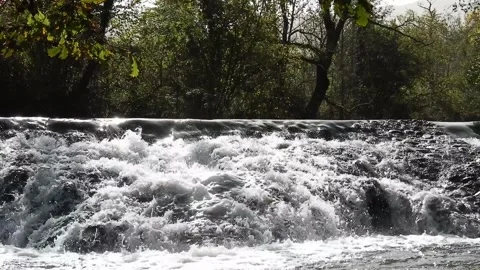 Water falling on a river artificial dam hd video Stock Footage 292508648