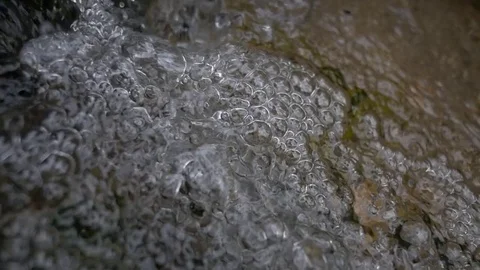 Water falling river creek bubbles winter forest macro 2 Stock Footage 80414762