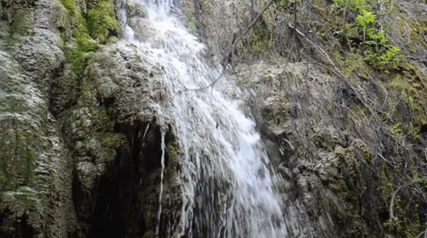 Water falling on to a rock Stock Footage 34411633