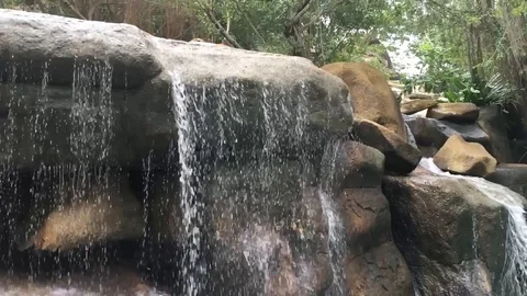 Water falling from the rock, slow motion video Stock Footage 101160269