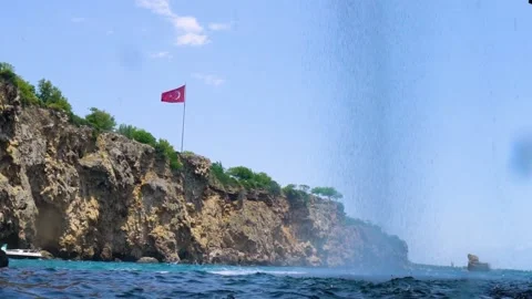 Water is Falling Into the Sea From The Cliffs of Antalya, Turkey Stock Footage 146332643