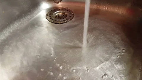 Water falling in a sink basin Stock Footage 71228192