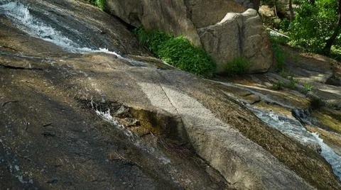Water Falling Stone Surface on the Mountain Valley Stock Photos