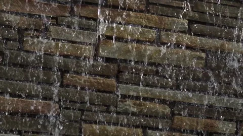 Water falling on stone work Video stock 76257163