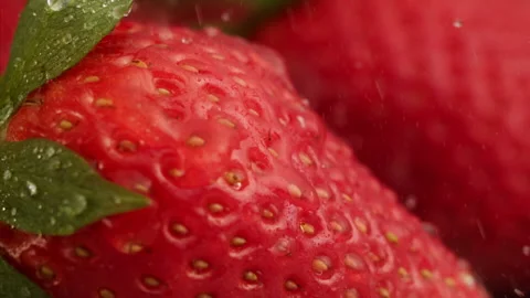 Water falling on strawberry in slow motion Stock Footage 156202096