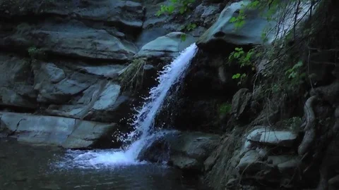 Water falling into a stream at Black Star Canyon Stock Footage 73922120