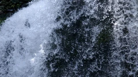 Water falling off the waterfall Stock Footage 74907927