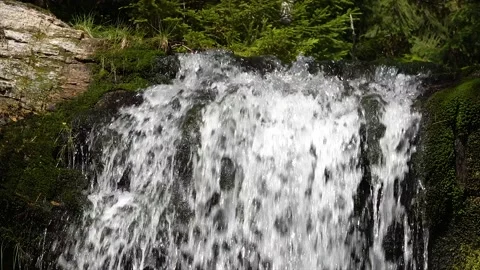 Water falling from a waterfall. Slow motion Czech nature. Stock Footage 146380952