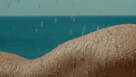  Water falling on a woman's hips in the sun Stock Footage 161471919