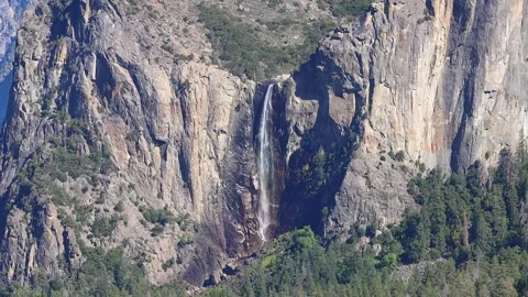 Water falling off Yosemite falls Stock Footage 289799372