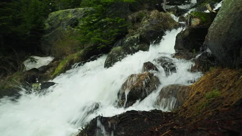 Water falls between all the rocks and cracks at the Rocky Mountain National Park Stock Footage 279528915