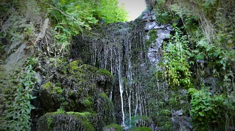 Water falls down the mountain 50 fps Stock Footage 52491416